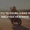 motorcyclist riding motorcycle in malaysia heatwave