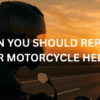 motorcyclist wearing motorcycle helmet while at evening