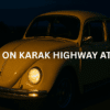 yellow volkswagen driving through karak highway at night